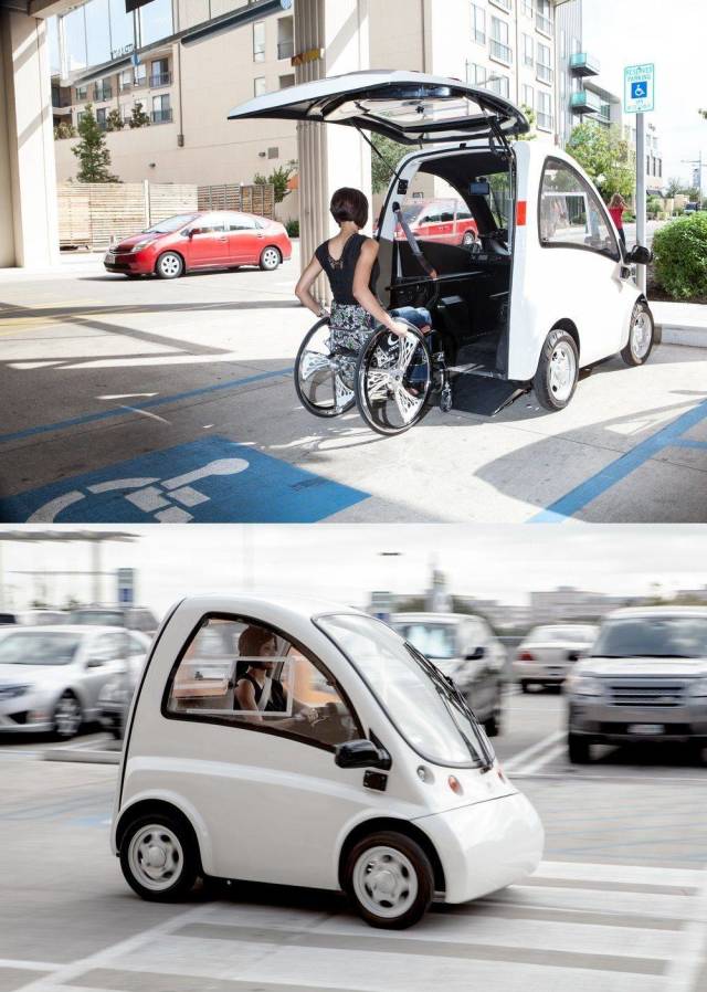 women in a wheelchair loaded into a mini car so she can drive on the road with ease