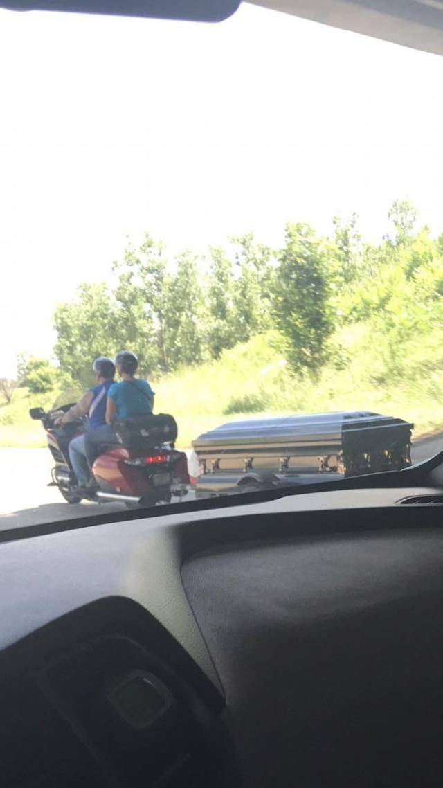 motorcycle pulling a casket