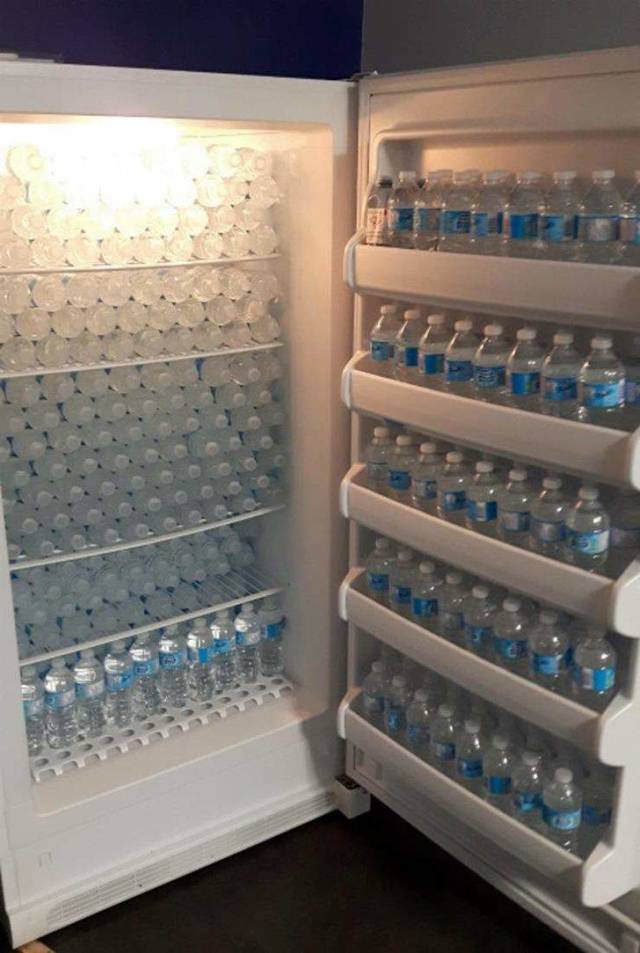 fridge full of water bottles