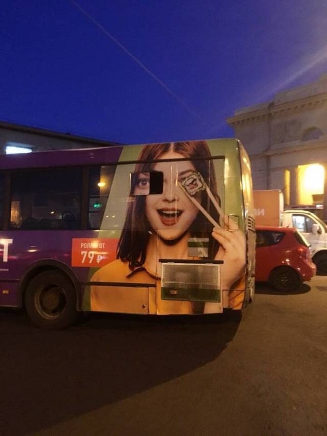 derp ad on a bus that has a window slid