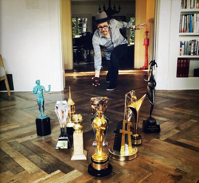 gary oldman with his awards -