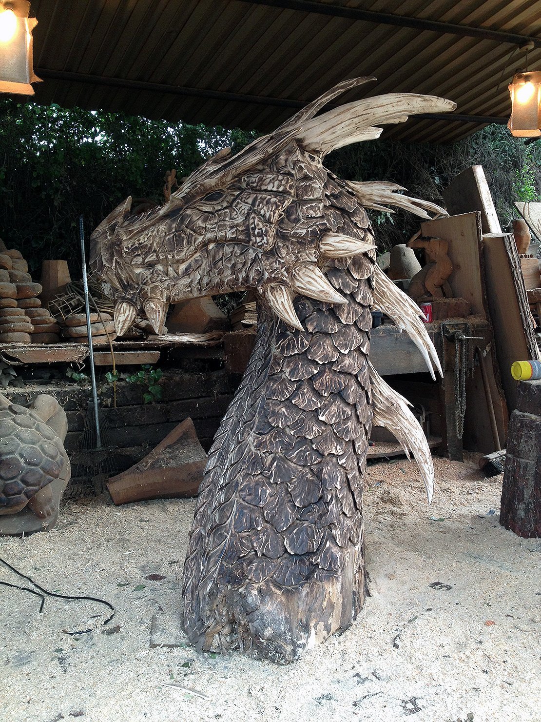 dragon carved in wood with a chainsaw
