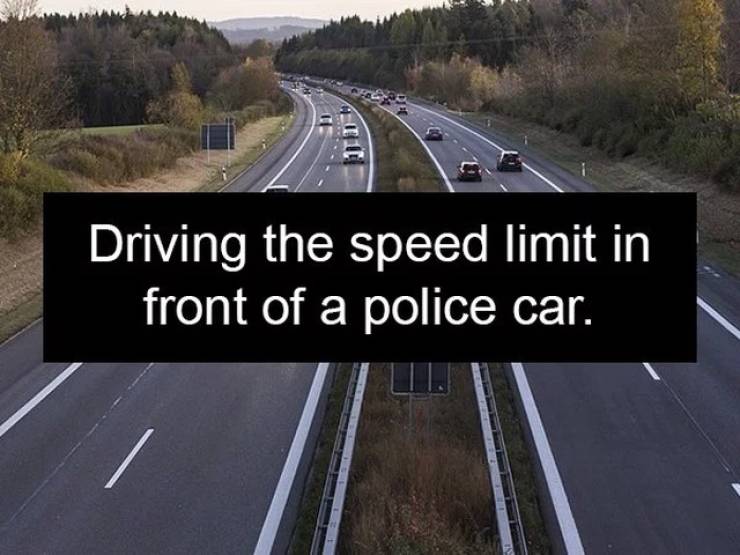 asphalt - Driving the speed limit in front of a police car.