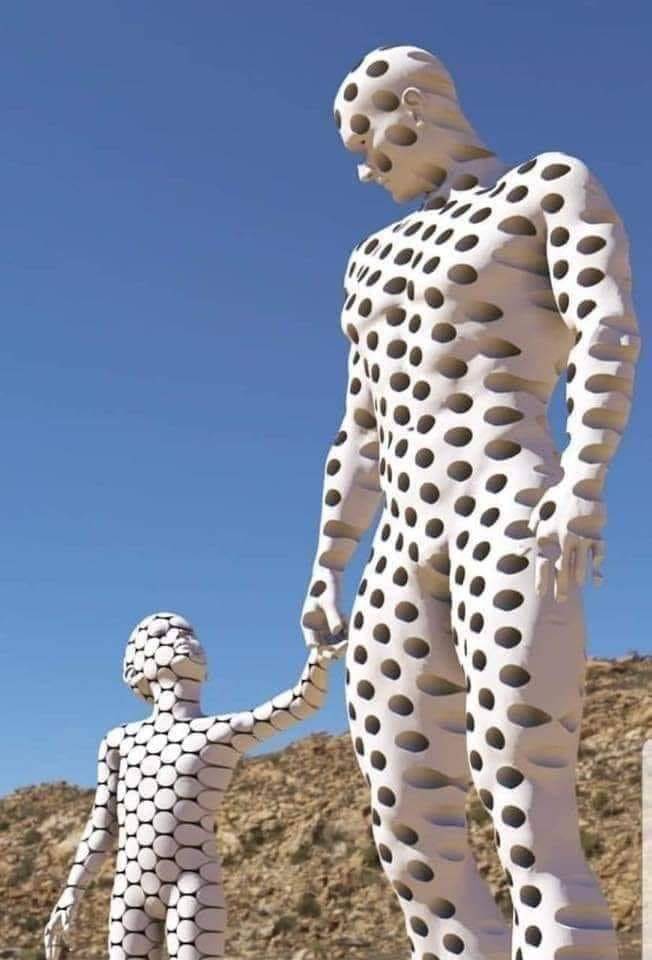 statue of man and son