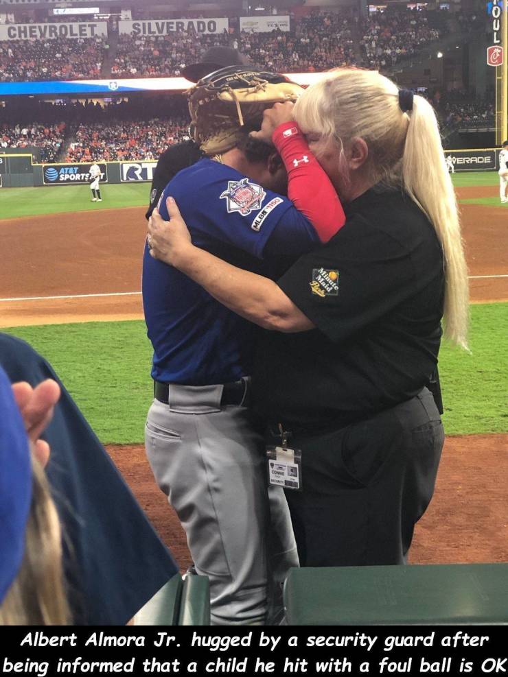 albert almora jr - Chevrolet Silverado Errde Sportet Mlb 150 Albert Almora Jr. hugged by a security guard after being informed that a child he hit with a foul ball is Ok