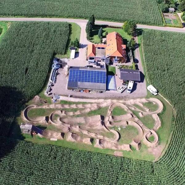 house with dirt bike track - Deece Swas An th W