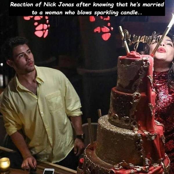 birthday cake of priyanka chopra - Reaction of Nick Jonas after knowing that he's married to a woman who blows sparkling candle..