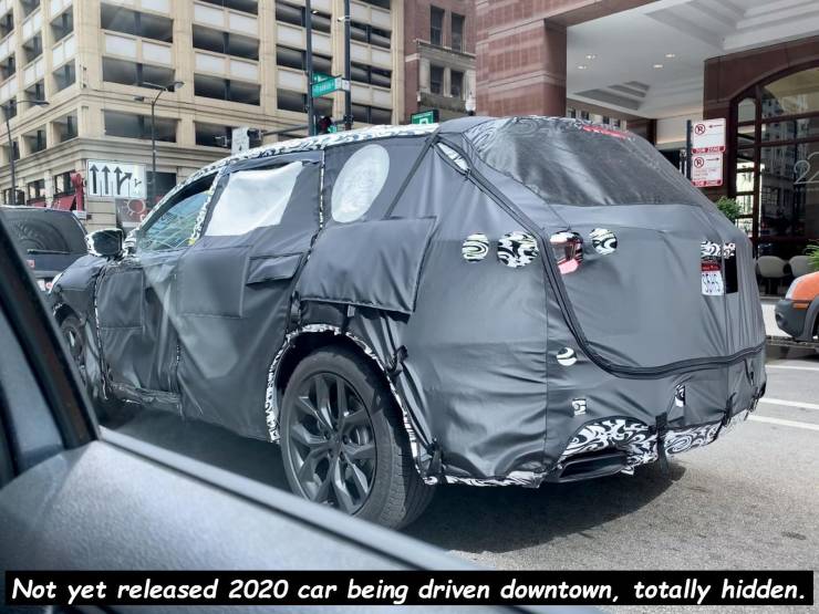 family car - Not yet released 2020 car being driven downtown, totally hidden.