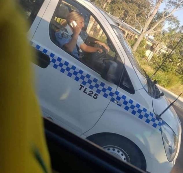 police on phone driving