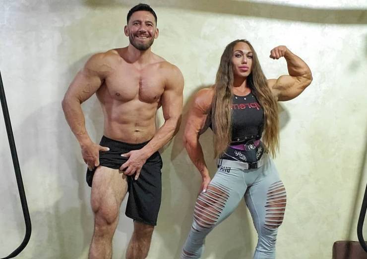 extremely muscled man and woman