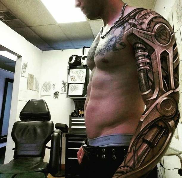 robot arm tattoo sleeve