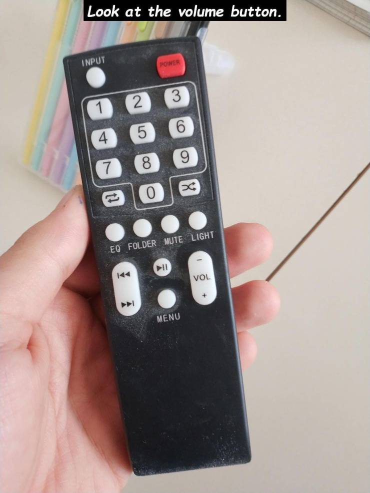 remote control - Look at the volume button. Input Poner 6 9 Eondo Eq Folder Mute Light Il Vol Menu