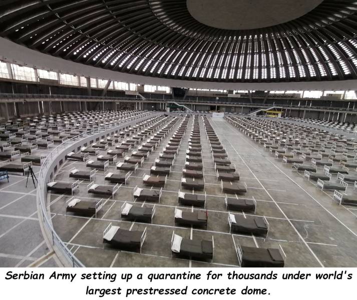 steel - Lam Serbian Army setting up a quarantine for thousands under world's largest prestressed concrete dome.