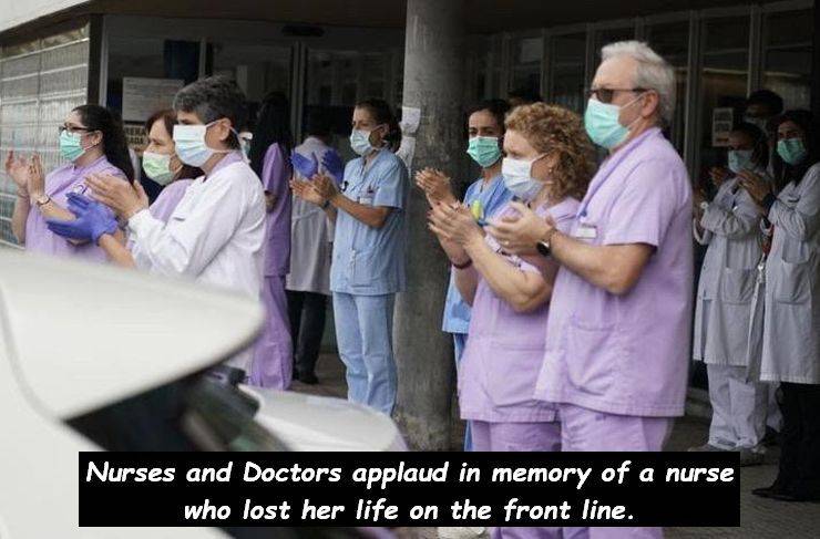 hospital - Nurses and Doctors applaud in memory of a nurse who lost her life on the front line.