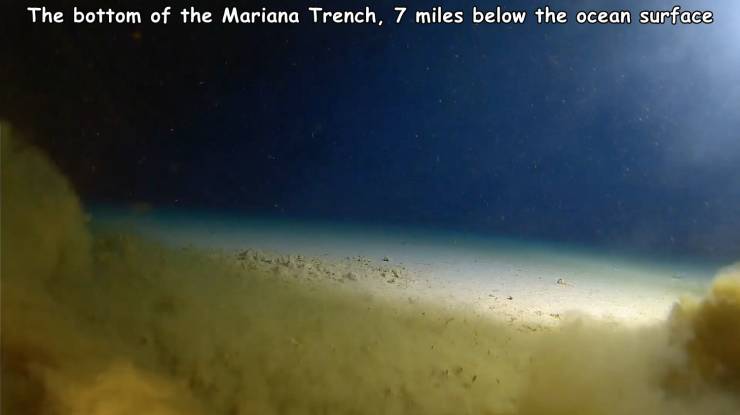 atmosphere - The bottom of the Mariana Trench, 7 miles below the ocean surface