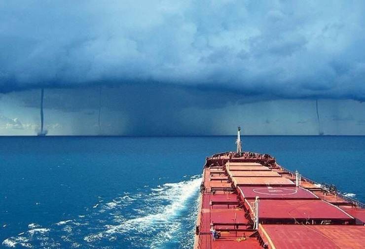 ship in front of storm