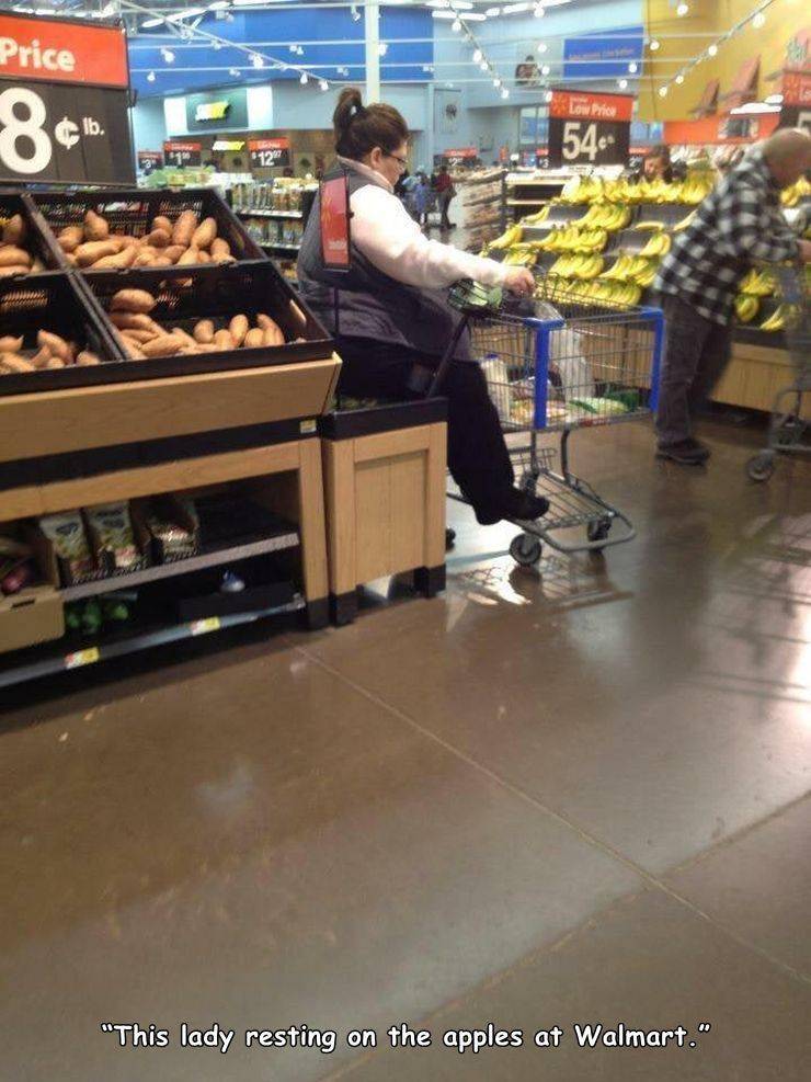 lady sitting on apples at walmart - Price Low Price 8 Ib. 546 12 "This lady resting on the apples at Walmart."