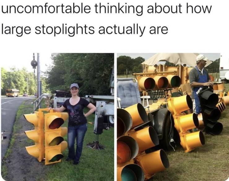 traffic light beside person - uncomfortable thinking about how large stoplights actually are