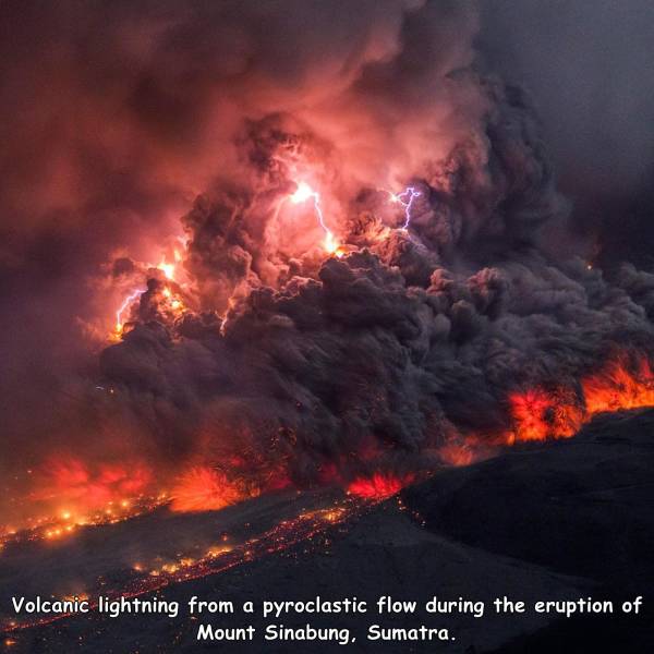 volcano eruption with lightning - Volcanic lightning from a pyroclastic flow during the eruption of Mount Sinabung, Sumatra.