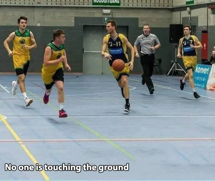 basketball player in ground - Envert konvent No one is touching the ground