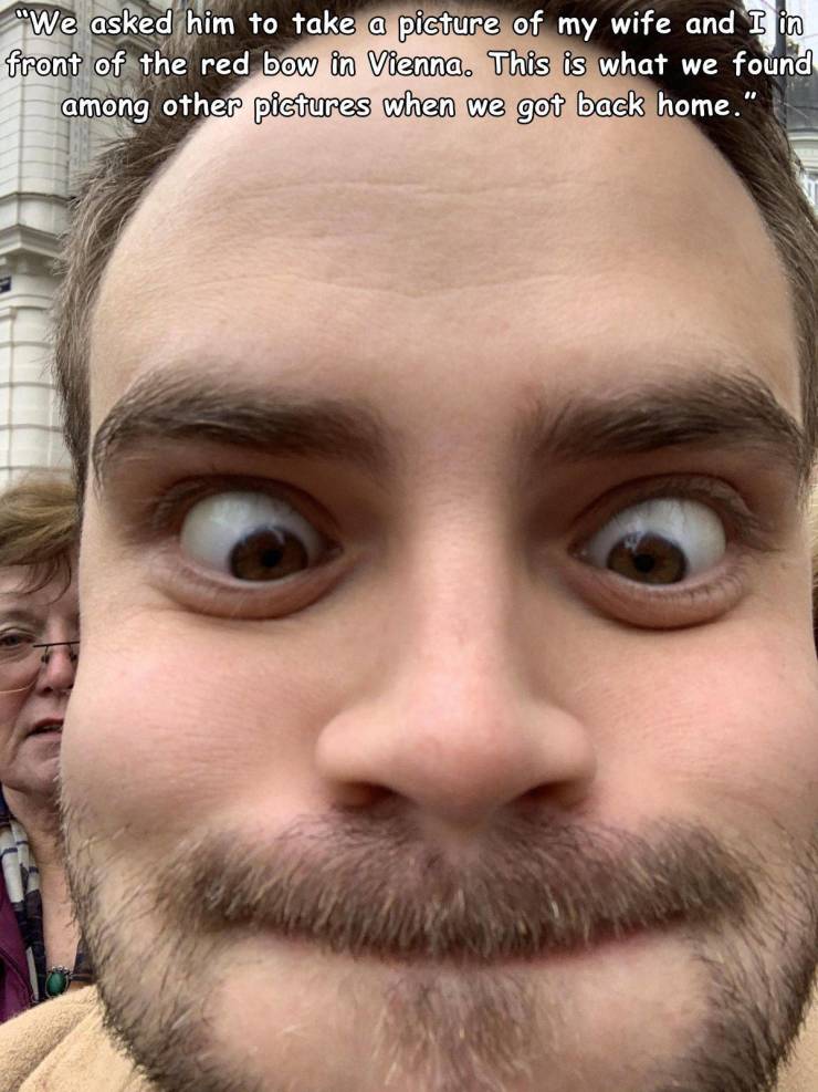 beard - We asked him to take a picture of my wife and I in front of the red bow in Vienna. This is what we found among other pictures when we got back home."