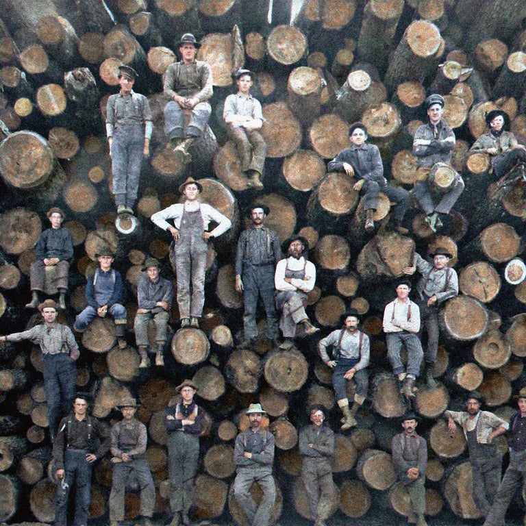 cool pics - lumberjacks on logs early 1900s