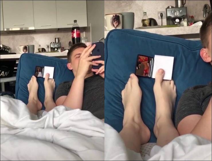 woman using feet to hold phone