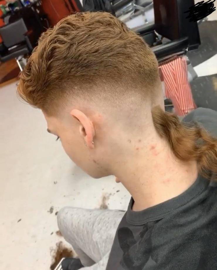 kid with crazy shaved mullet hair cut