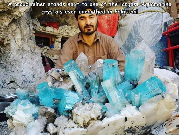 waste - A proud miner stands next to one of the largest Aquamarine crystals ever unearthed in Pakistan!