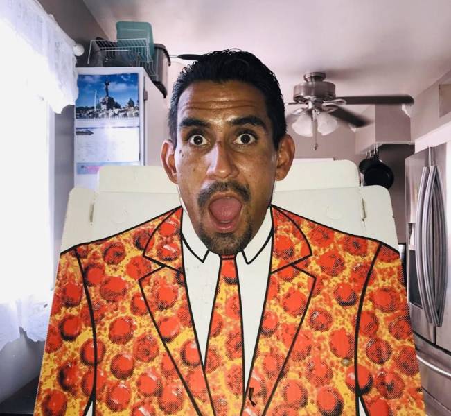 guy wearing pepperoni pizza suit