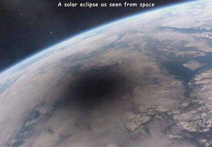 solar eclipse seen from space - A solar eclipse as seen from space