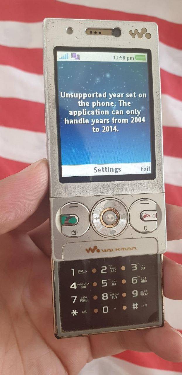 Throw The Phone - Unsupported year set on the phone. The application can only handle years from 2004 to 2014. Settings Exit no C Walkman Def 3 2 Vap Abc Cec 4 Jkl Ghi o Wxyz Tuv 7 aA