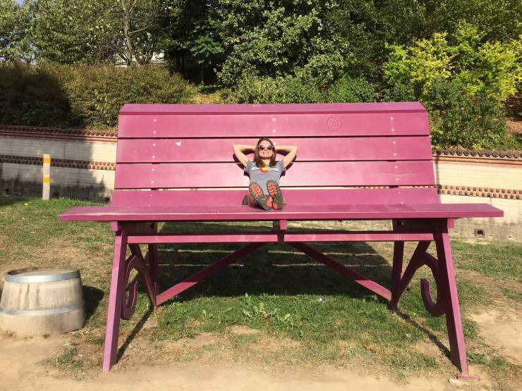 funny pics and random photos - huge bench makes woman look tiny