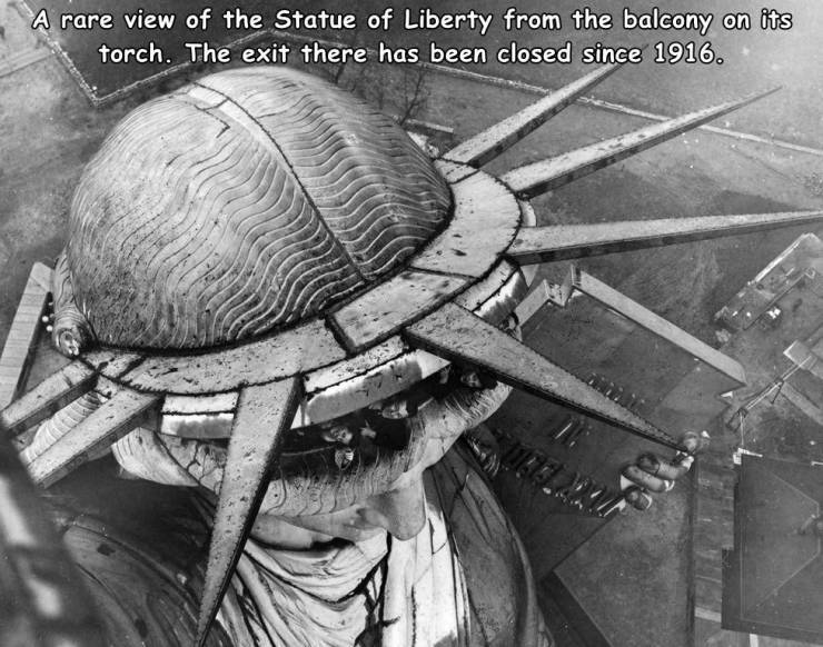 funny pics and random photos - statue of liberty hair - A rare view of the Statue of Liberty from the balcony on its torch. The exit there has been closed since 1916.