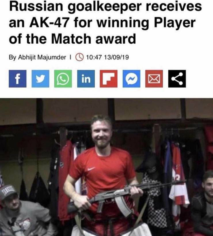 photo caption - Russian goalkeeper receives an Ak47 for winning Player of the Match award By Abhijit Majumder 130919 f y V