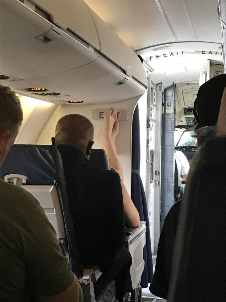 funny meme - person on plane with their bare feet up in the air