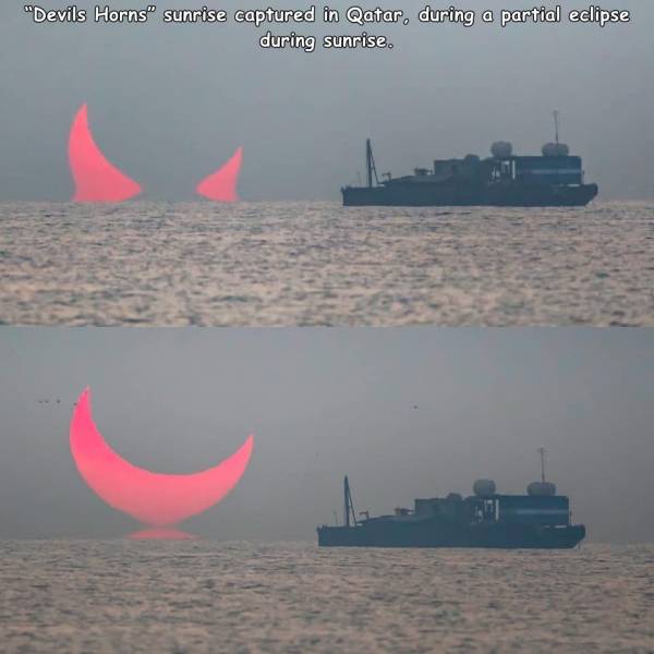 water transportation - "Devils Horns" sunrise captured in Qatar, during a partial eclipse during sunrise.