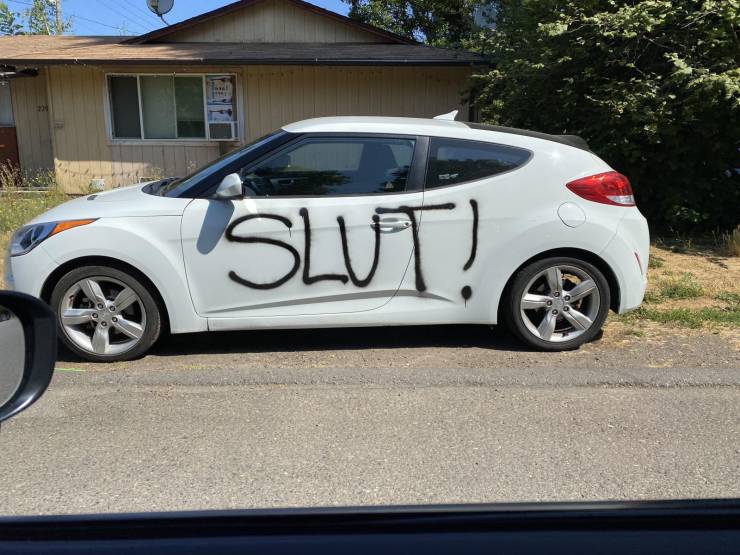 funny pics - car with the word slut spray painted on it