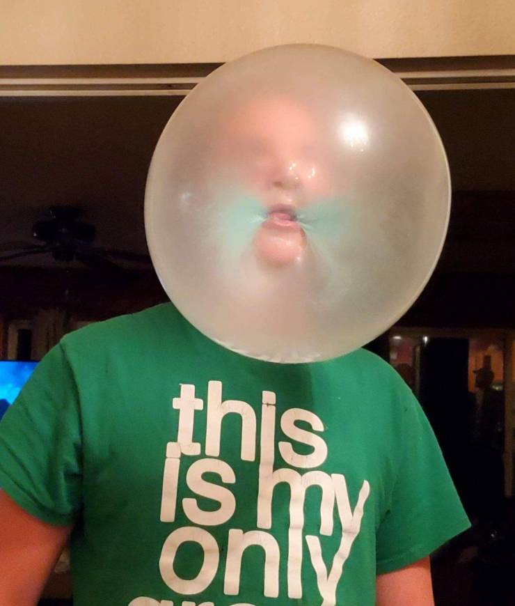 funny pics - guy blowing huge bubble gum