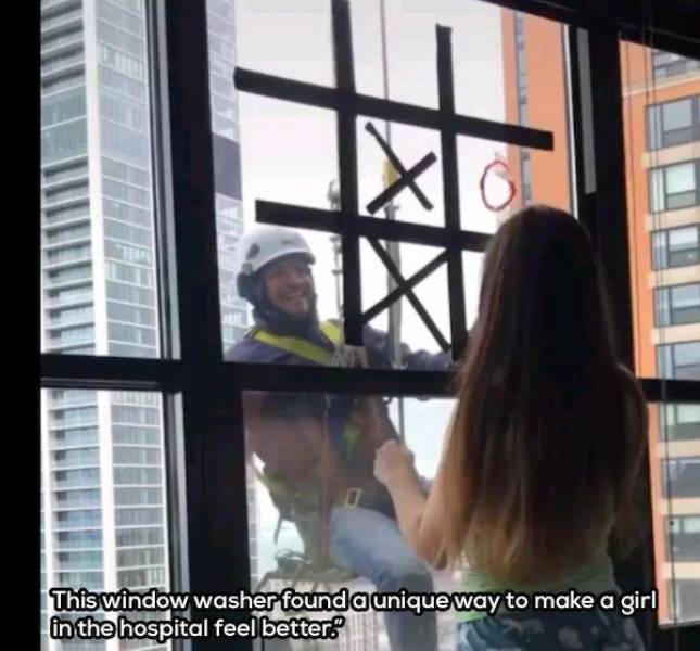 funny random pics - window - This window washer found a unique way to make a girl in the hospital feel better!