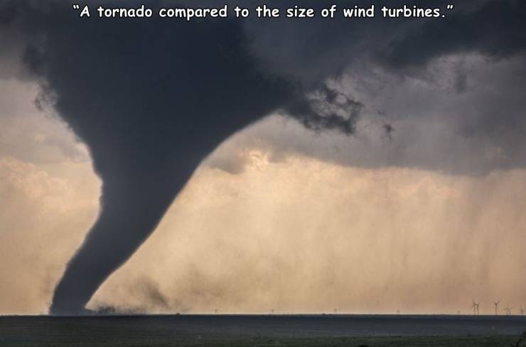 funny random photos - a tornado compared to the size of wind turbines