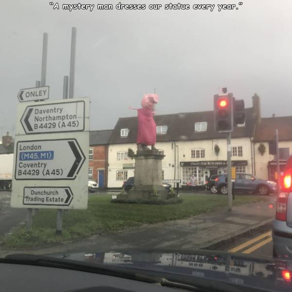 billboard - "A mystery man dresses our statue every year." Onley Daventry Northampton B4429 A 45 Il London M45.M1 Coventry B4429 A45 De Dunchurch Trading Estate