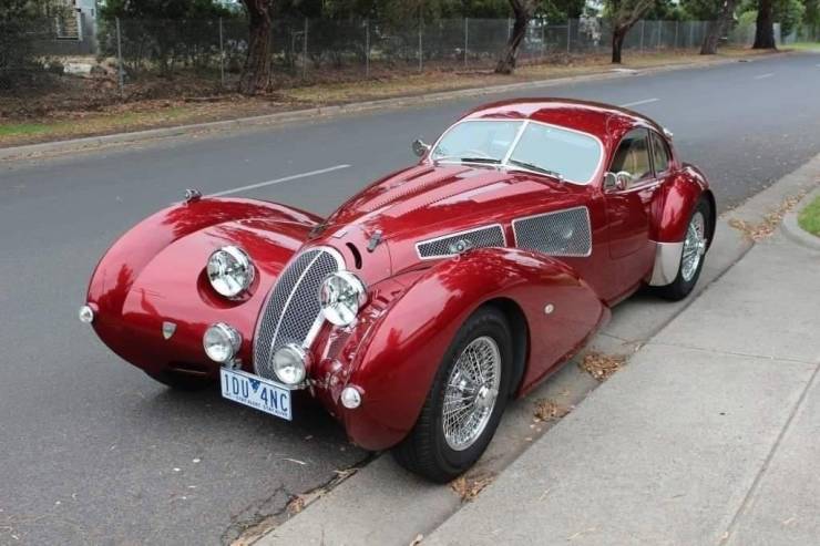 funny pictures - devaux coupe red vintage sports car