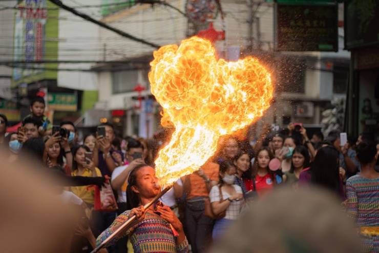 funny pictures - guy blowing fire out of his mouth but it looks like a penis