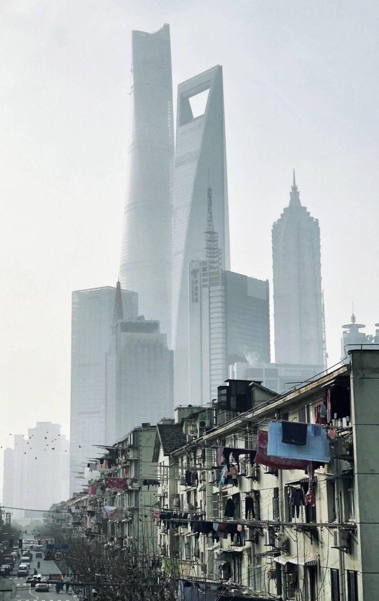 funny pictures - shanghai different angle showing poor side of town