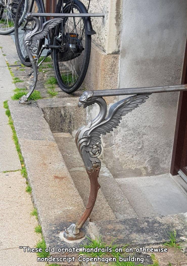 road bicycle - "These old ornate handrails on an othrewise nondescript Copenhagen building.