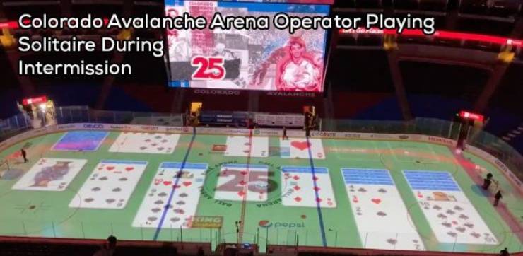 casino - Colorado Avalanche Arena Operator Playing Solitaire During Intermission 25 Coordo G pepsi