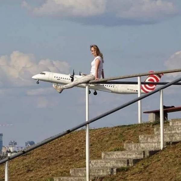 cool pics - woman looks like she's riding an airplane