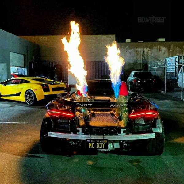cool pics - cool race car with flames coming out the back - license plate says mc didy