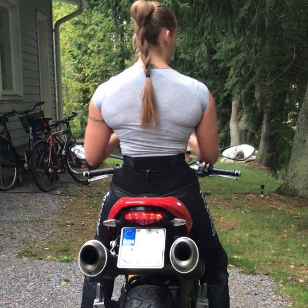 cool funny pics - really buff muscular woman riding a motorcyle